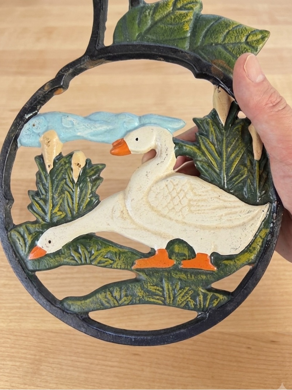 Vintage French cast iron hand painted geese trivet in a good condition.